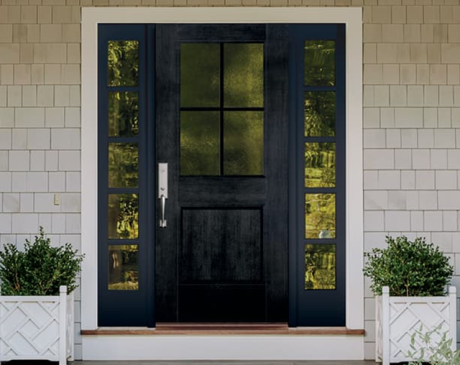 Tan Siding with Black Front Door