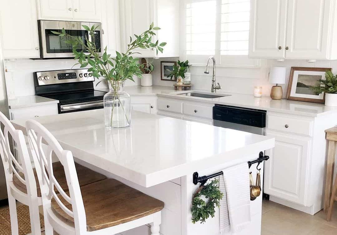 Shiplap Island with White Kitchen Cabinet and Countertop